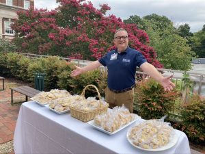 Director of Development David Huskins greeting new students with open arms and cookies!