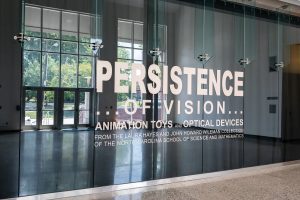 photo of signage for Persistence of Vision