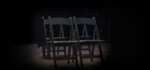 Four chairs on a stage for the opera dwb (Driving While Black)