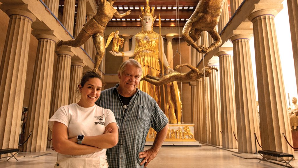 Art alumnus Alan LaQuire with his statue of Athena
