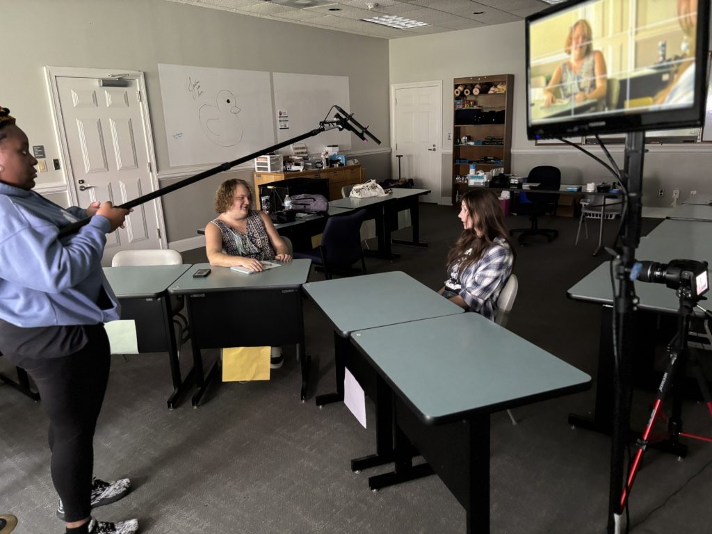 Trinity Matthews on boom mic, Willow Bland and Marlee Hale