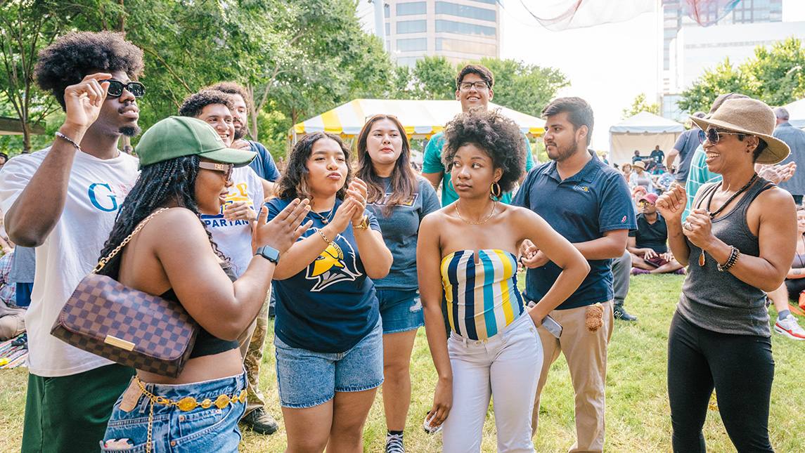 picture of UNCG students enjoying NC Folk Fest